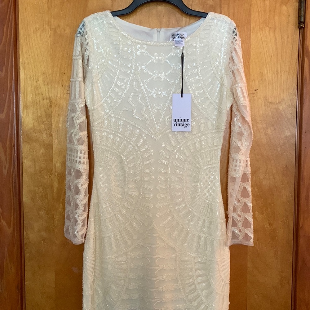 Ivory long sleeved flapper dress